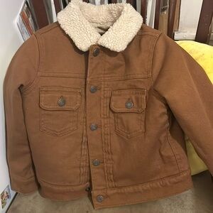 Toddler denim jacket with lambs wool lining.